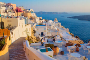 Blue and white Greek building overlooking the Aegean Sea.